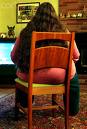 Woman sitting in a chair