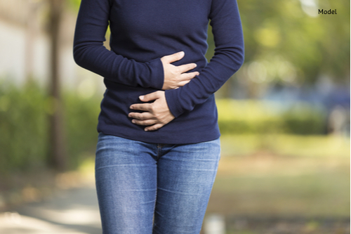 Woman with hurting Stomach Ache at Park-img-blog