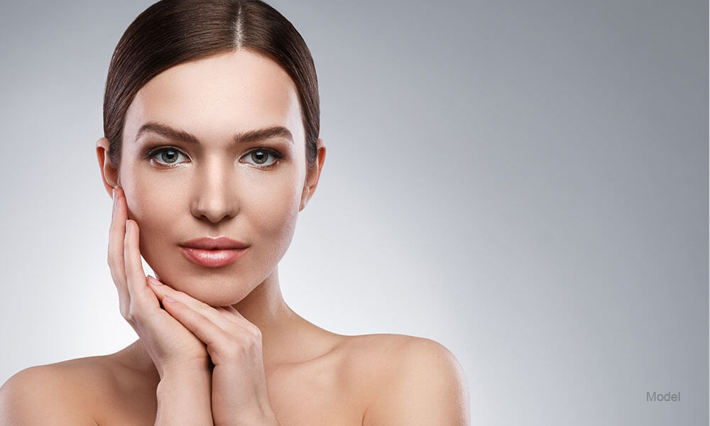 Female touching her chin